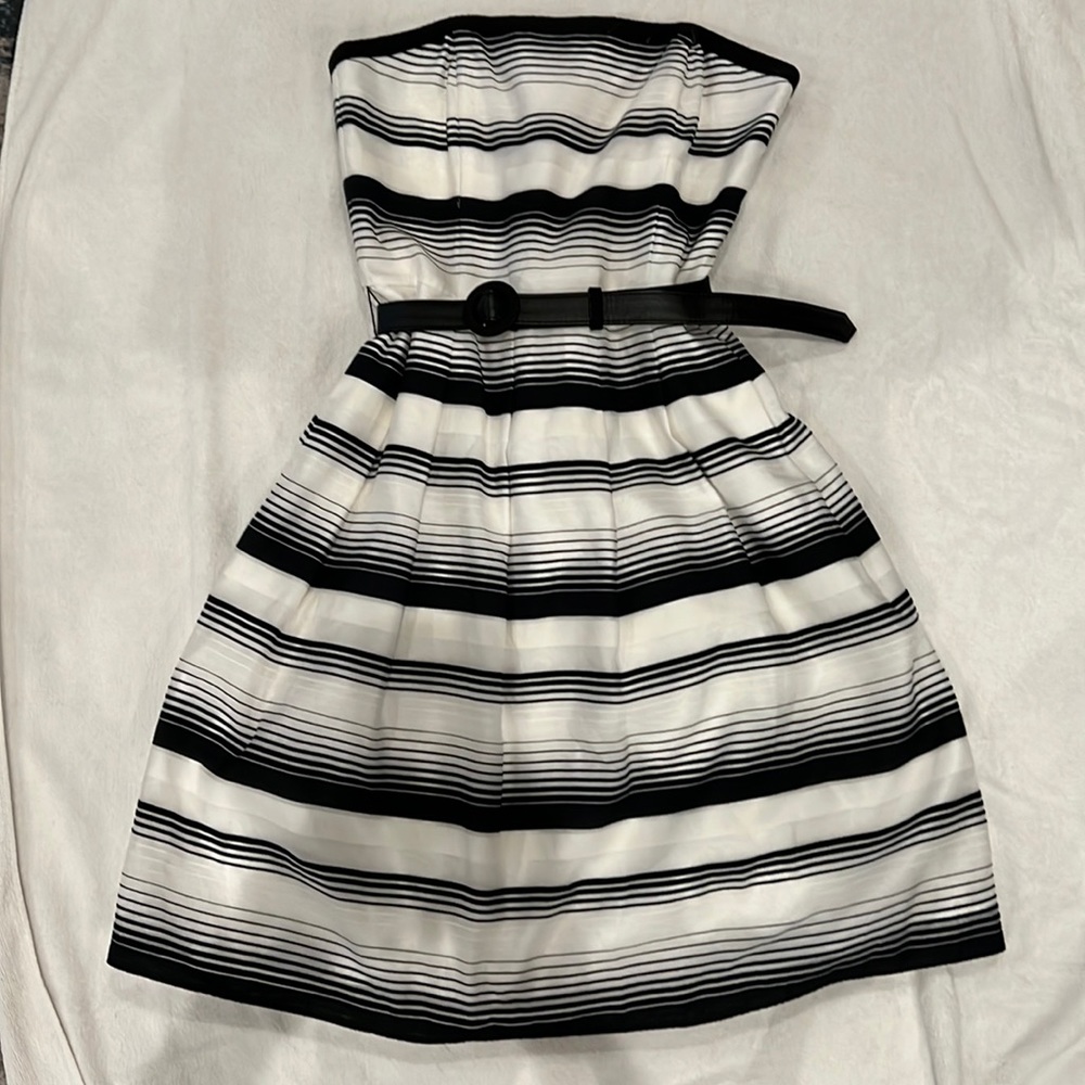 Black and white striped strapless dress.